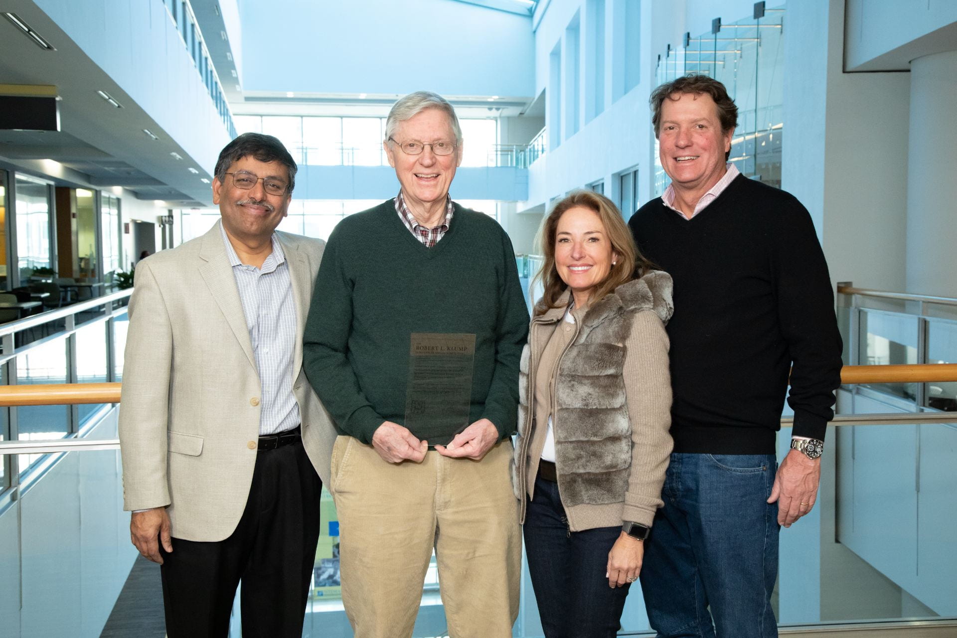 Members of the Klump family with lung cancer physician Ramaswamy Govindan, MD