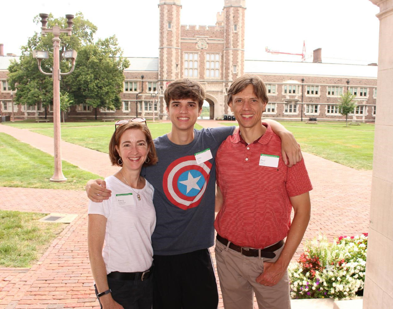 Nancy, John, and Paul Tice in front of Brookings Hall.